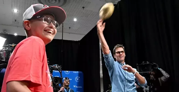 Legendary Quarterback Teams Up to Fulfill Young Fan's Dream